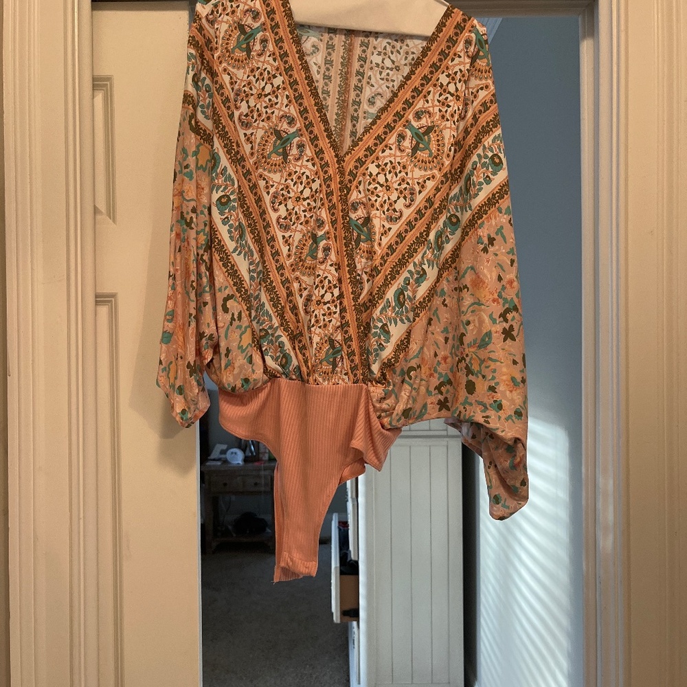 Flowy sleeve floral body suit